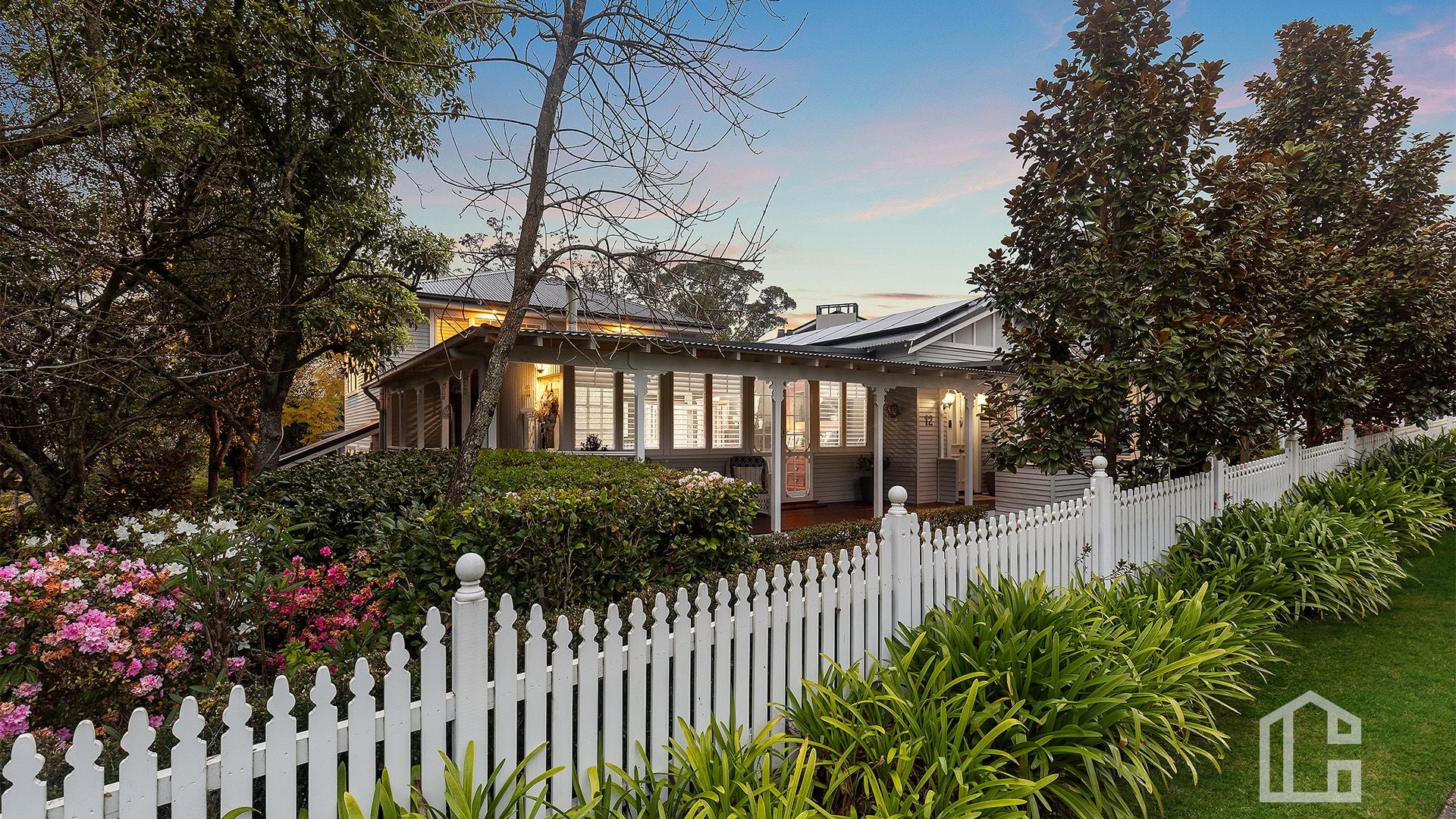 12 Taringha Street, a Blue Mountains home with a verandah and established garden